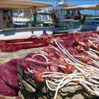 Le barche e le reti dei pescatori